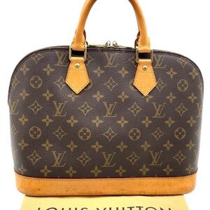 Authentic Louis Vuitton Monogram
Alma PM Hand Bag W/Dustbag
